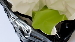 Using electrical tape and thin plastic as a structure, because of pressure this basket slowly collapses into itself.